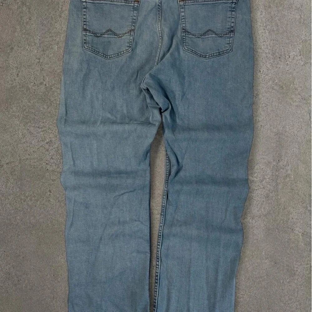 2000s wrangler workwear light washed denim bootcut jeans